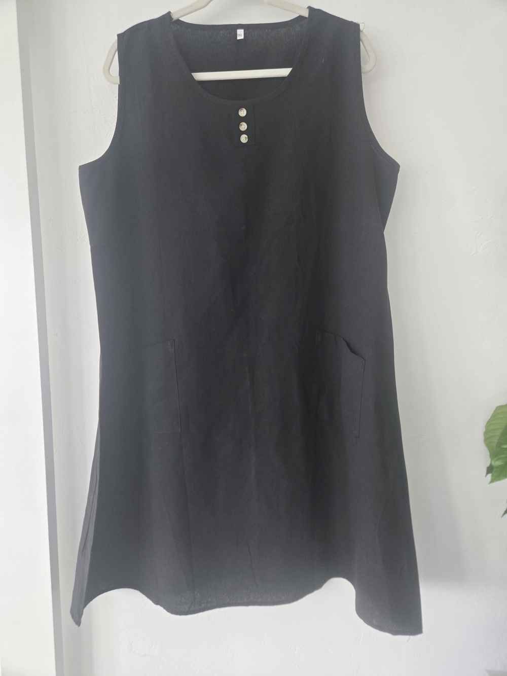 Sleeveless Black Shift Dress with Button Detail
